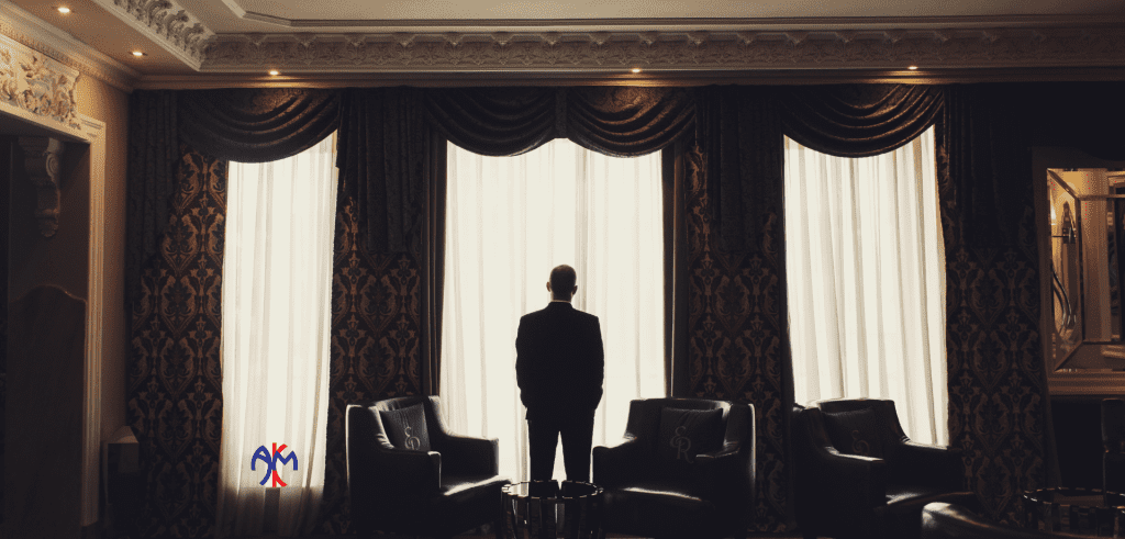 Luxury curtains Dubai executive office with ornate valances and sheer panels providing elegant window treatment