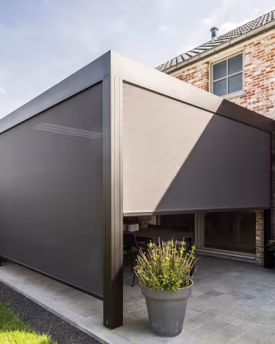 Fully closed zip screen blinds providing privacy and shade on a residential outdoor area in Dubai