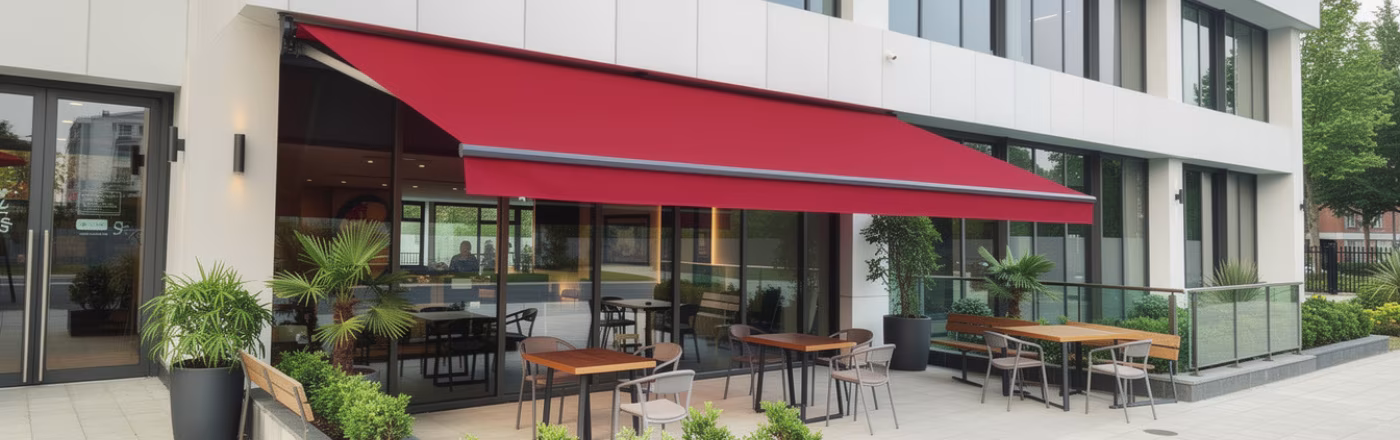 Premium retractable awning installed over a Dubai villa outdoor terrace — motorized gearbox with Spanish acrylic fabric