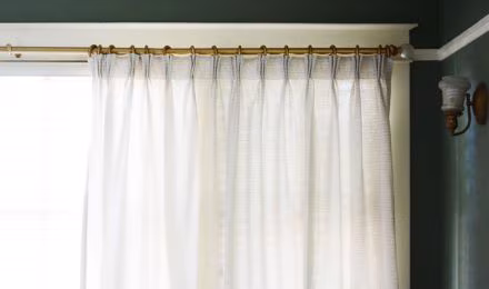Pencil pleat curtains Dubai — classic gathered heading custom curtains for traditional interiors