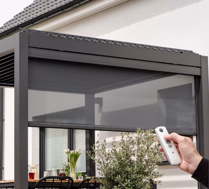 Motorized outdoor zip screen blinds Dubai — wind resistant automated outdoor roller blind Somfy compatible