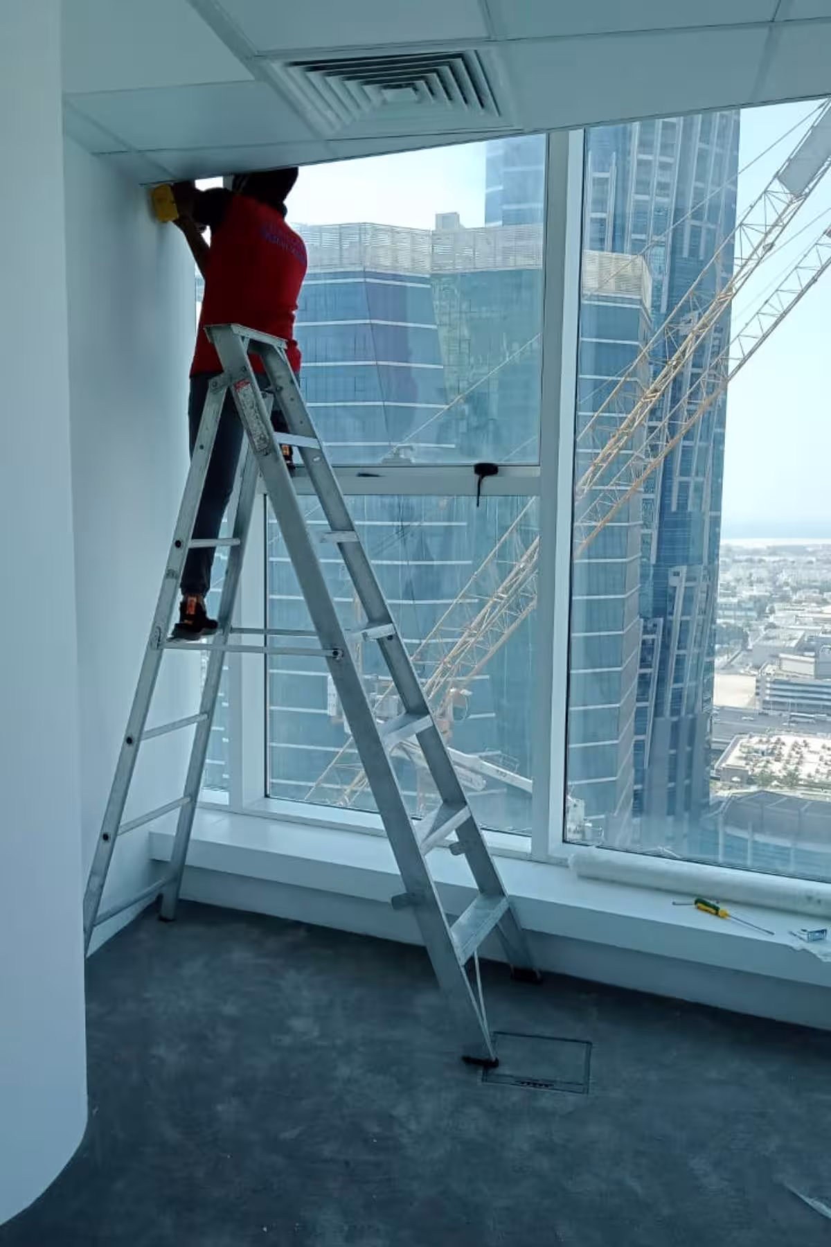 Ongoing roller blinds installation in Al Manara Tower, Dubai — Creative Vision Global